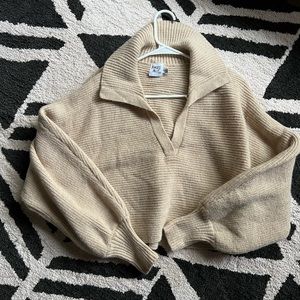 Tan sweater.